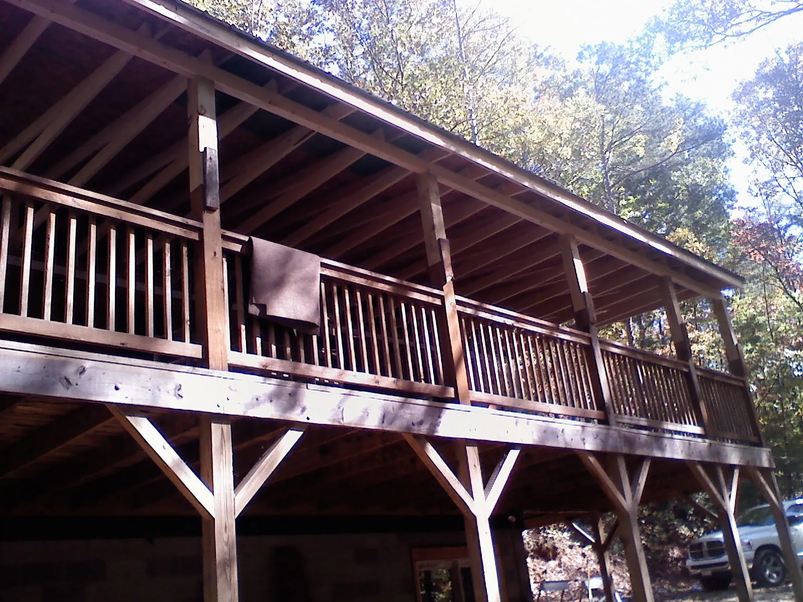 Timber framing under a new elevated porch and deck — Roof Leak Repair in Garden Prairie by Roofing Brothers